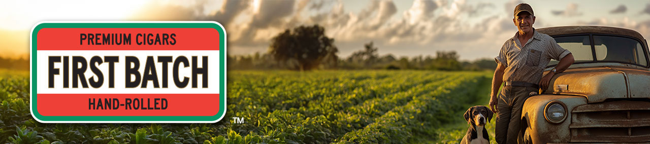 Banner_First26 - Don Palomón Cigars Brand banner: 'FIRST BATCH' premium cigars with 'HAND-ROLLED' label, set against a farm field and a man with a dog beside a vintage truck at sunset.